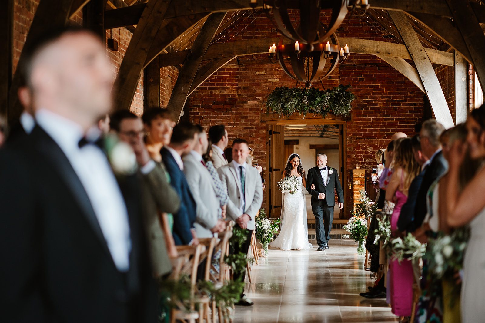 Bride and her father walk down the aisle at Grangefields Wedding venue in Derbyshire