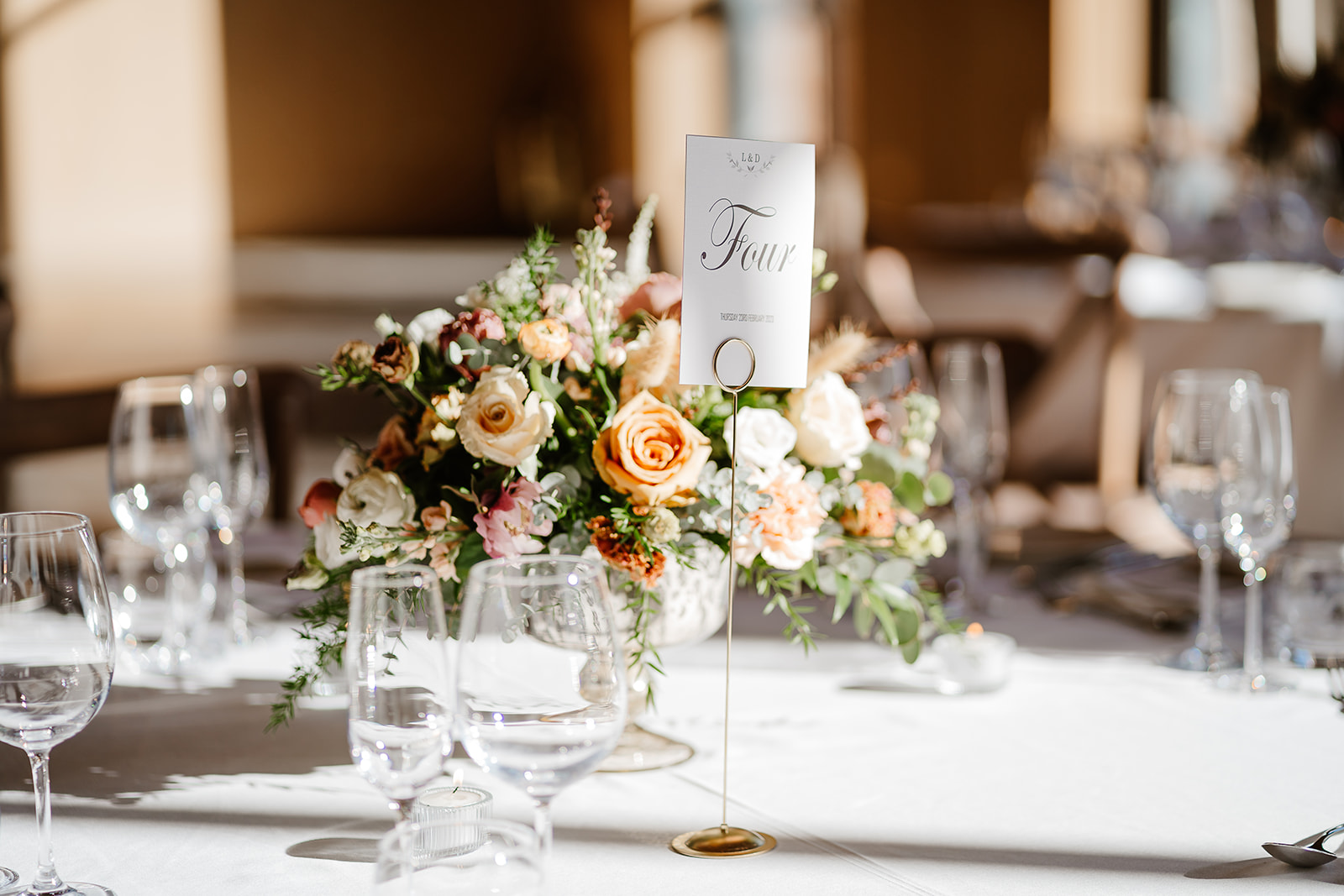 Sunlit details on table at wedding