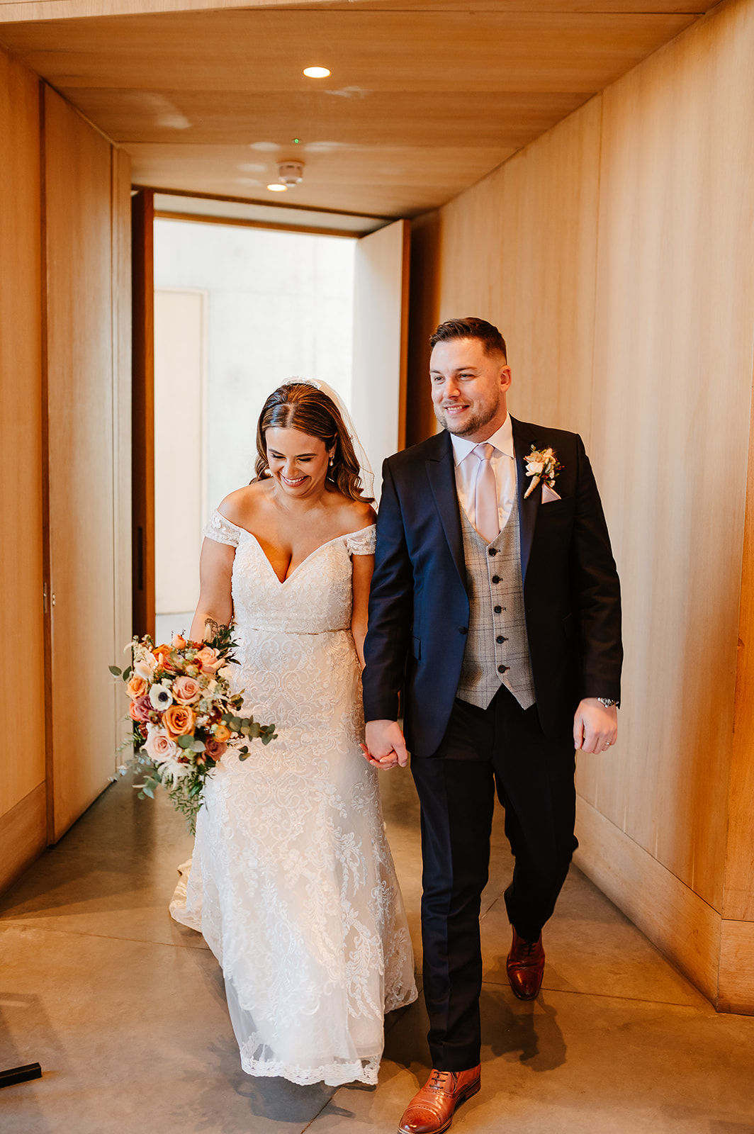 Bride and groom enter room