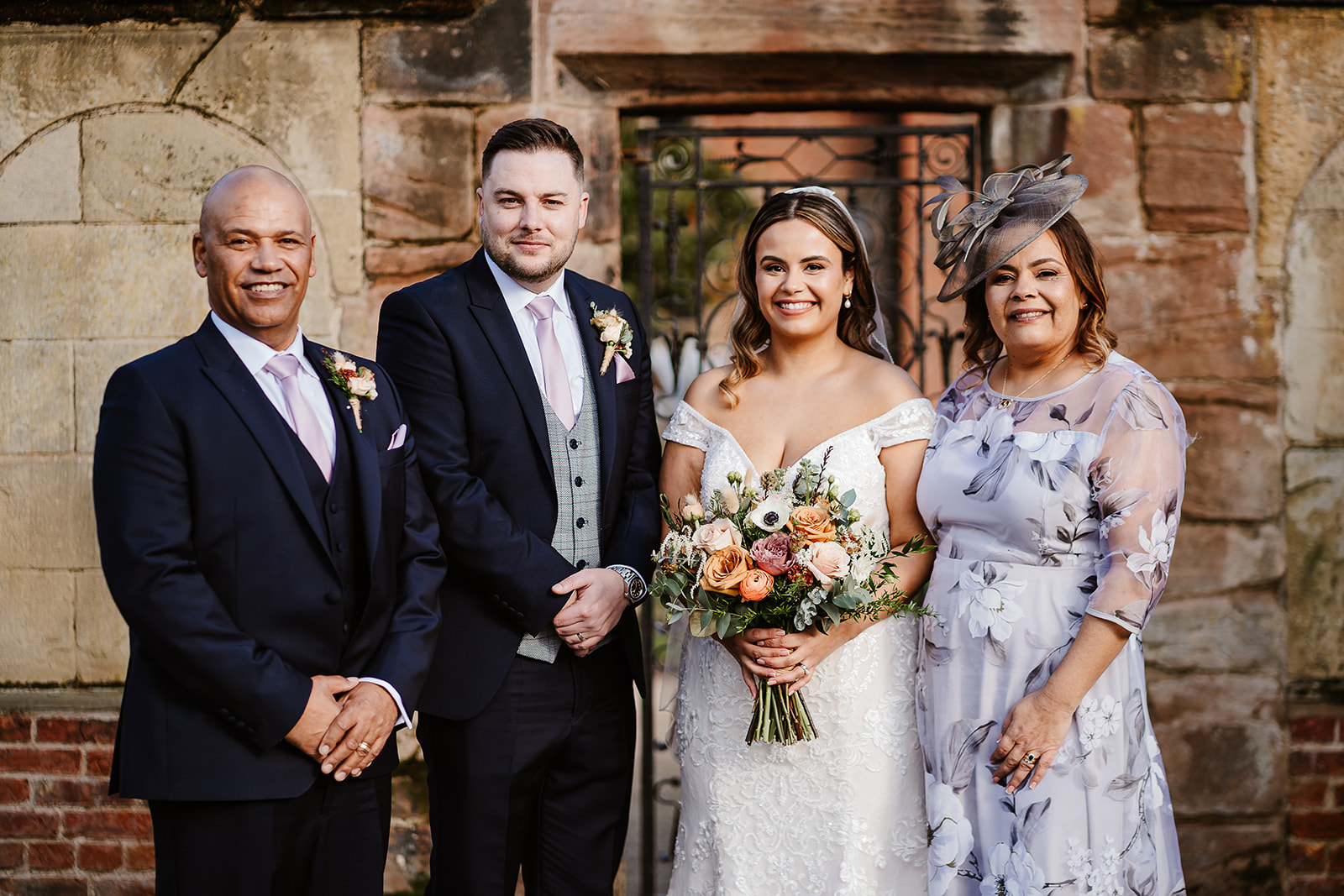 Bride and with groom with parents