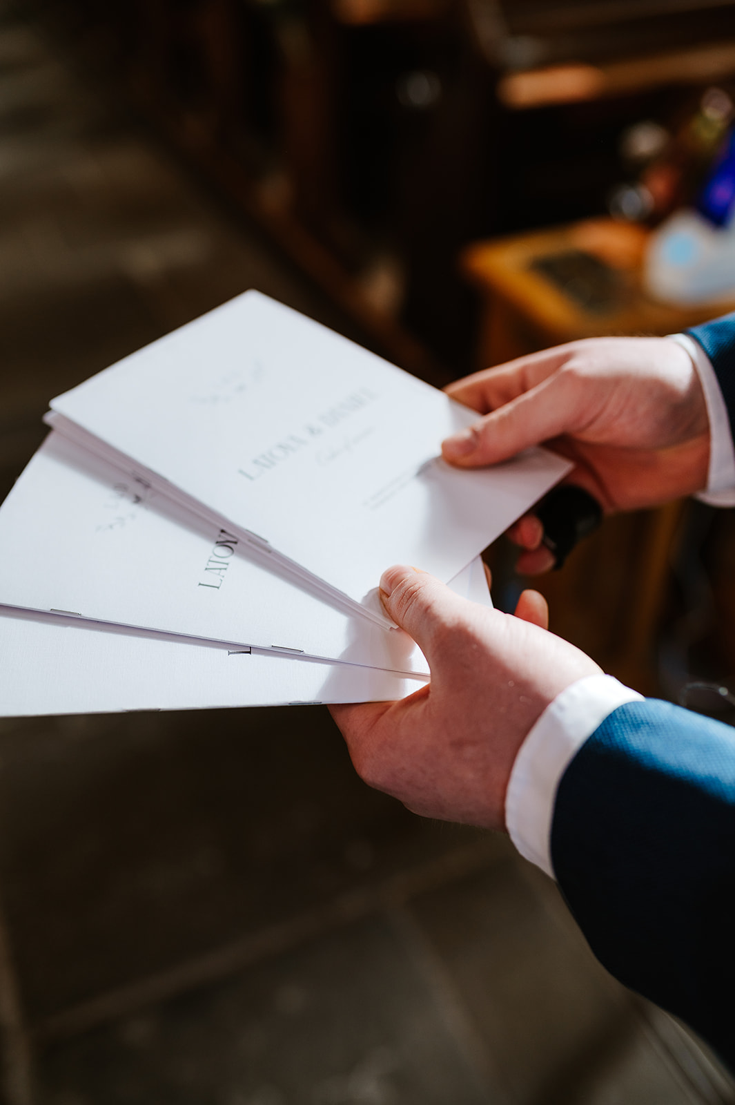 Wedding order details held in hands